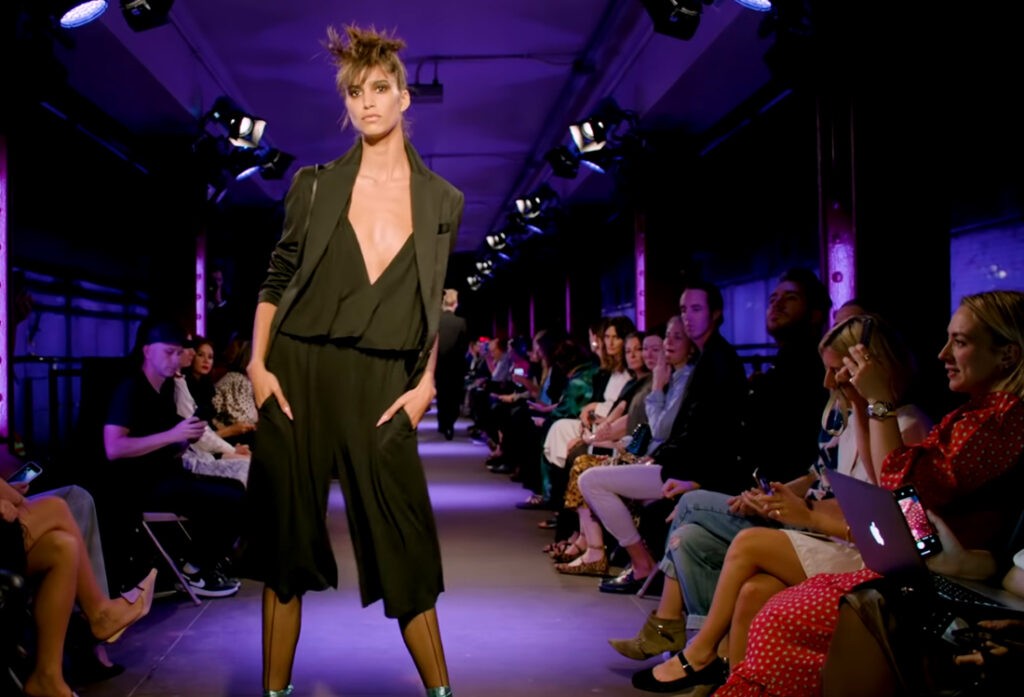 Tom Ford Spring Summer 2020. Black low cut top with matching black bottom, womenswear.