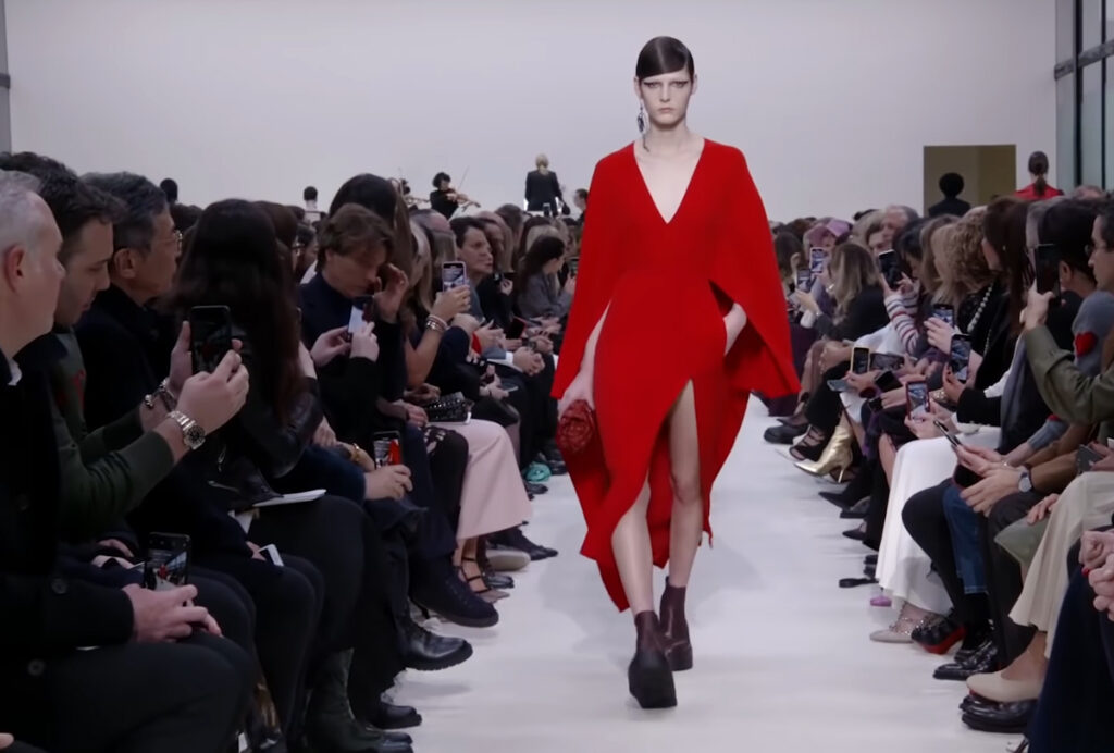 Lush red dress evening wear look. A Symphony of Fashion with The Fall Winter 2020 Collection by Valentino