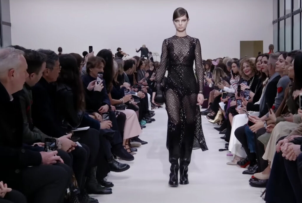 Black outfit with shiny silver elements. A Symphony of Fashion with The Fall Winter 2020 Collection by Valentino
