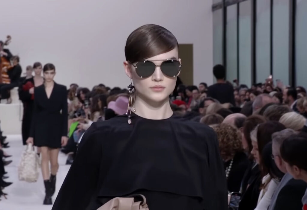Aviator shades and a rock'n'roll look for women close-up photo. A Symphony of Fashion with The Fall Winter 2020 Collection by Valentino