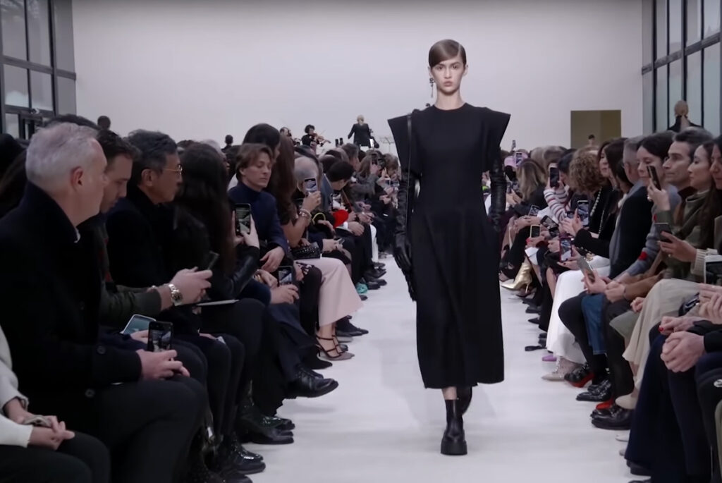 Evening wear black dress. A Symphony of Fashion with The Fall Winter 2020 Collection by Valentino