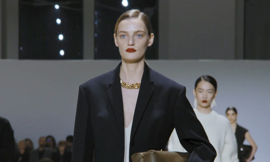 Business chic black blazer for women, close-up look. Refined Design with Jil Sander Fall Winter 2020
