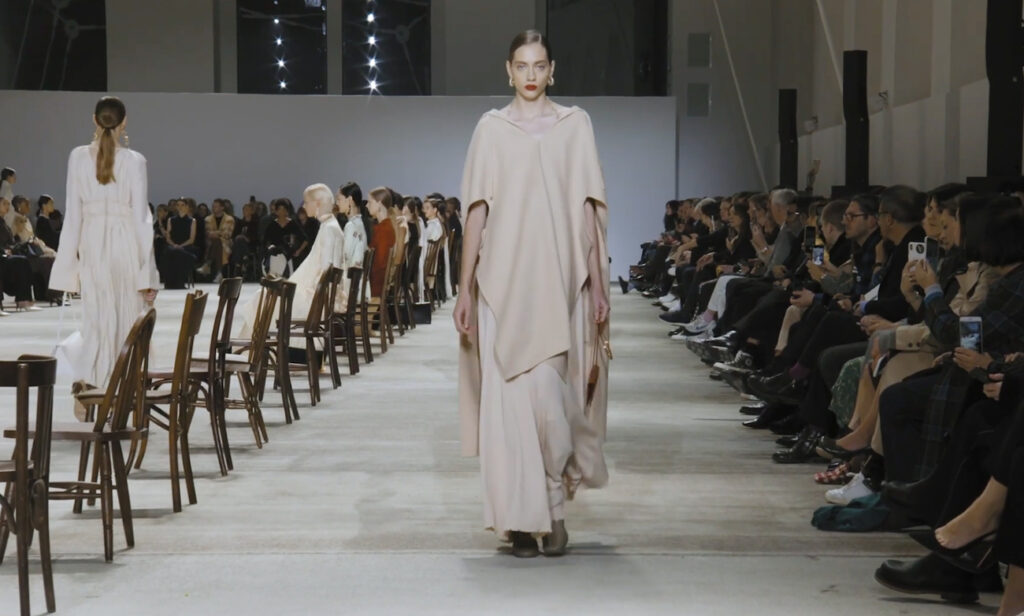 Off-white dress and cape winter look. Refined Design with Jil Sander Fall Winter 2020