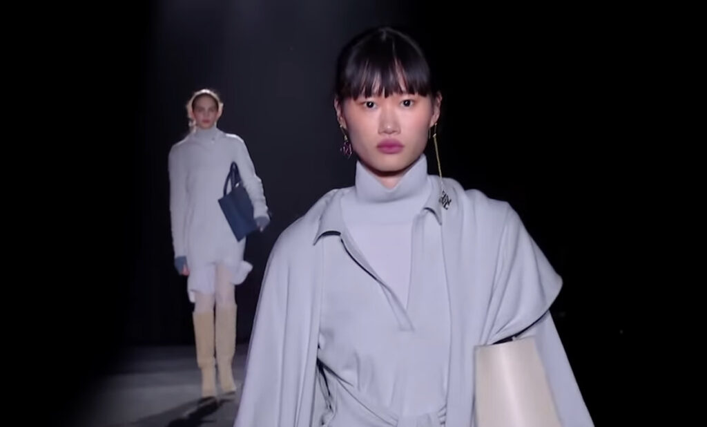 Beautiful light blue winter outfit. Cloes-up photo. Harmony and Beauty from Barcelona with Naulover Fall Winter 2020/ 2021